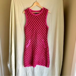 Adorable pink sweater dress by Aqua. Sleeveless with hot pink accents!